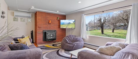 Main Floor Living Room W 55 Inch Smart TV