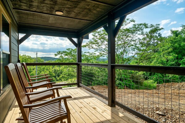 Relax and rock away while enjoying the view on the upstairs deck