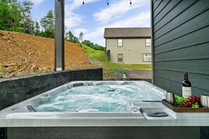 Relax after a great day adventuring in a jetted hot tub that can fit up to 5( please use only plastic drinkware provided)