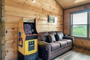 Games, movies, or beautiful views are all available in this game room