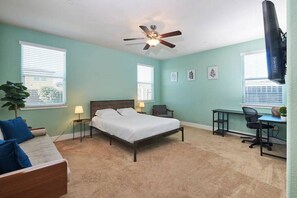 Master Bedroom - 1 Queen bed, full bathroom, and 1 couch with 50" TV and Roku.