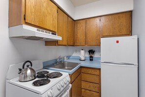 Fully equipped kitchen with modern appliances and ample counter space for all your cooking needs.