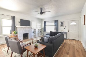 Cozy living room with 50"TV, and Roku.