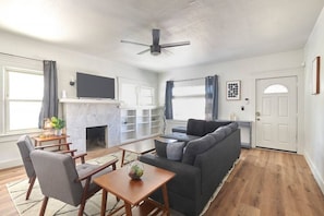Cozy living room with 50"TV, and Roku.
