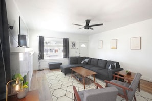 Cozy living room with 50"TV, and Roku.