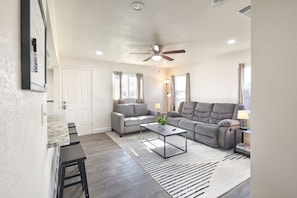 Warm & Relaxing living room for the family with 50"  TV & Roku.