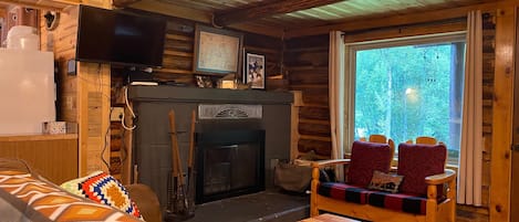 living area with large fireplace