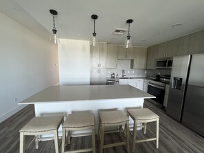 New bar stools and pendant lights