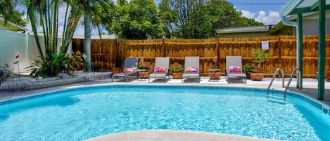 Saltwater pool (heated optional) and lounge chairs. 