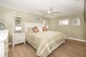 Bedroom with king-sized bed, closet, large dresser, 2 night stands, full bath.