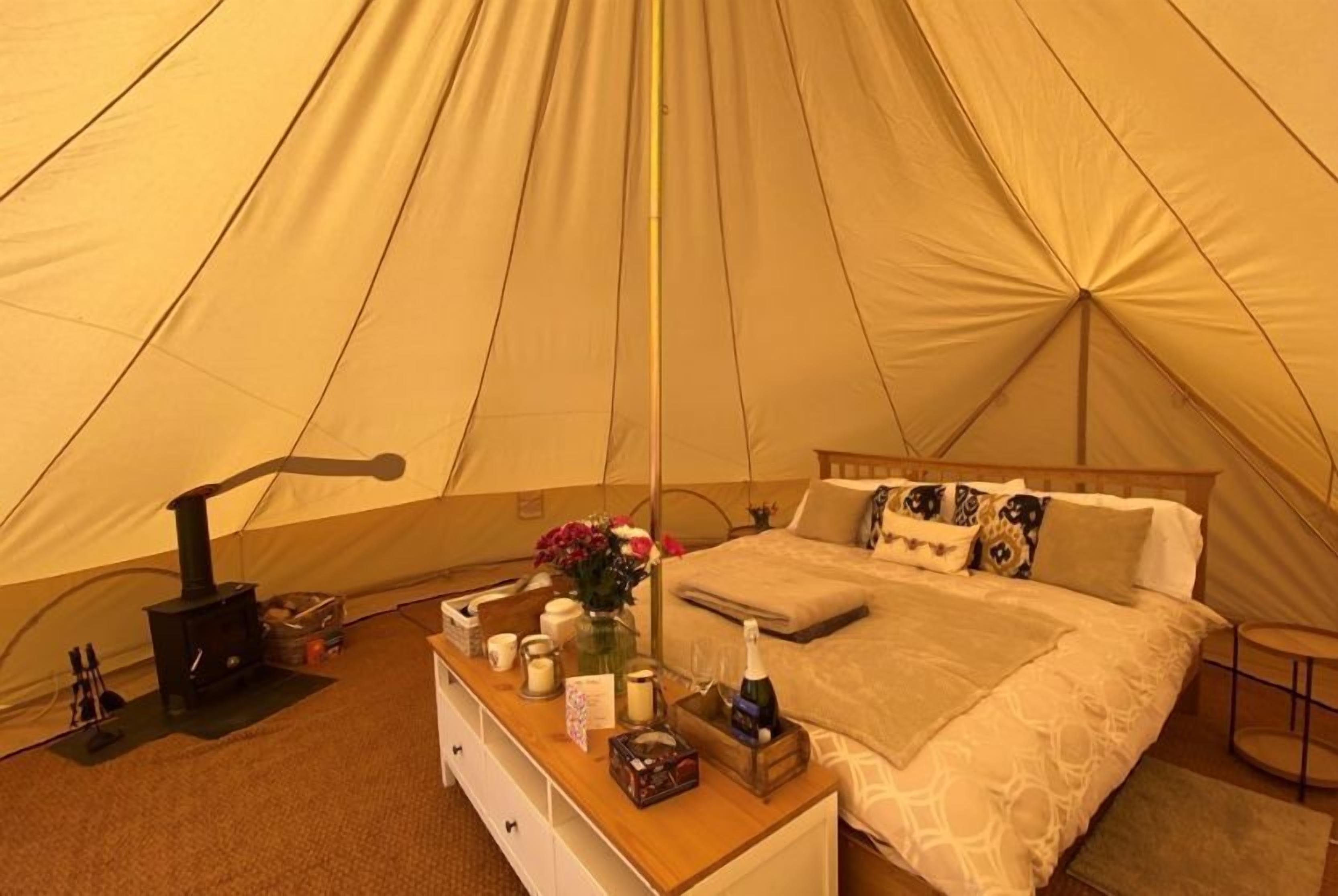 Bell tent in ultimate luxury with a wood fired hot tub super king size bed Stafford District Vrbo