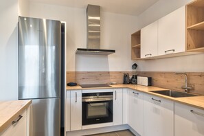 Fully equipped kitchen open to the living room