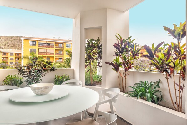 Large terrace with dining table 