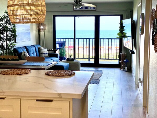 Ocean View straight through the condo and out living room sliding glass doors.