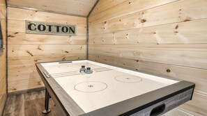 Experience the ultimate gaming destination with our Air Hockey table - it's the perfect spot for some friendly competition and hours of fun!