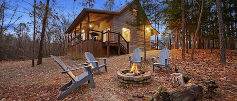 Cozy cabin retreat in the heart of the woods, where stories come to life by the firelight.