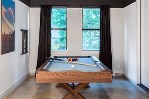 Game Room With A Pool Table, Perfect For Indoor Entertainment