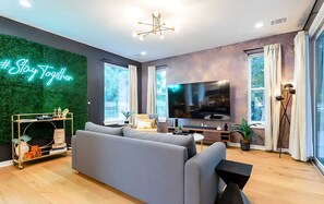 Modern Living Room With Stylish Decor And Smart-TV