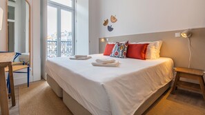 The comfortable bed and lightly decorated room are sure to give you a good night's sleep #cozy #comfort #portugal #pt #lisbon