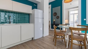 Fully equipped kitchenette for your home cooked meals. The dining area has natural light sources near it #homecooking #naturallight #portugal #pt #lisbon