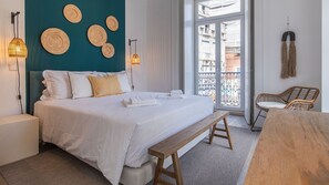 This beautifully decorated room's comfortable bed is sure to give you a good night's sleep #comfort #decoration #portugal #pt #lisbon
