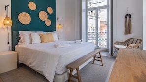 This beautifully decorated room's comfortable bed is sure to give you a good night's sleep #comfort #decoration #portugal #pt #lisbon