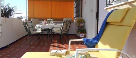 Extensive private terrace (30m2), very sunny (south facing) with awning and garden furniture.