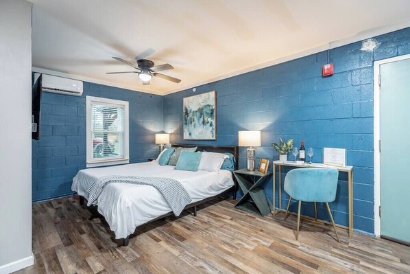 A beautiful studio with a king bed.