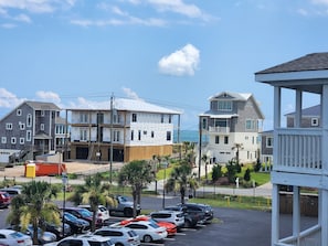 current beach view from condo with new beach access boardwalk between new homes