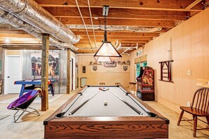 Game Room with pool table, Ms. PacMan game console, air hockey, and Smart TV