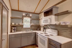 Newly renovated kitchen. New cabinets, new appliances, new dishes