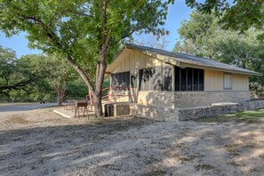 Sit on the porch swing and enjoy view of Guadalupe River.