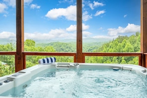 Both hot tubs feature incredible views of the surrounding mountains.