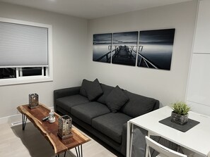 Living room
Urban Barn wide cushion base couch
Very comfy to sleep on