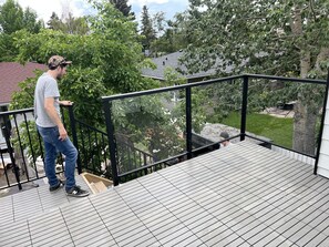 Your own private 115 sq ft patio in the tree tops. Privacy wall added as well. 