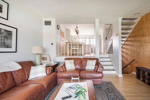 Let the sun shine in! Bask in the bright and airy living room.