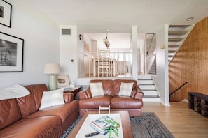 Let the sun shine in! Bask in the bright and airy living room.