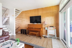 Kick back and relax in the cozy living room with a movie or play or tune or two on the piano!