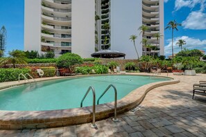 The Community Pool is Nestled in the Front of the Building