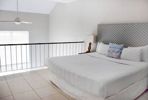 Bedroom with a King size bed and flat screen TV