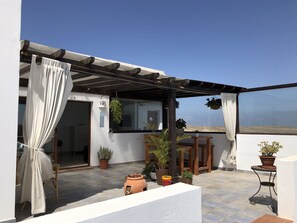 Terrace comes with big outdoor dining table