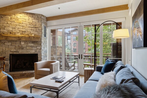 Living Area with Gas Fireplace and Patio