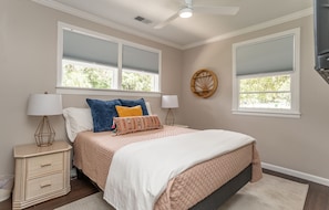 Queen bed with black out shades, smart TV