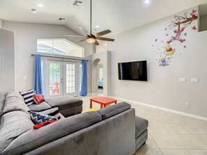 Living room featuring a flat-screen TV—perfect for movie nights.