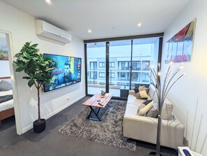 Open plan living area - living room and balcony