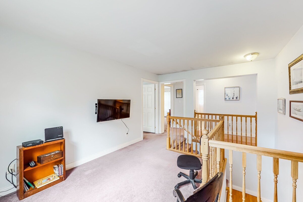 Idyllic waterfront home with furnished deck, grill, sweeping views & private W/D