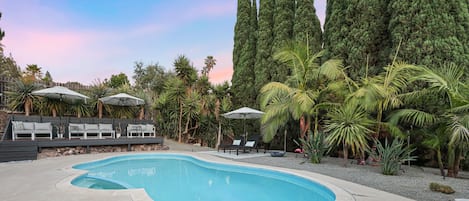 Relax and enjoy all San Diego has to offer from this plush, private oasis in the foothills of Mt Helix.