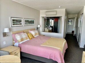 View across bed to bathroom