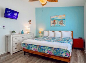 Master bedroom with comfortable king bed.