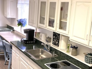 Full kitchen with built in range (no oven)